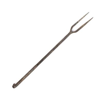 Fourchette à viande utilisée