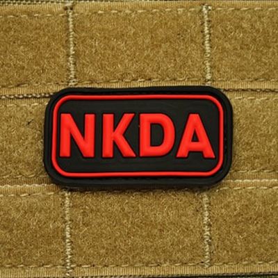 Écusson KREV NKDA plastique NOIR/ROUGE